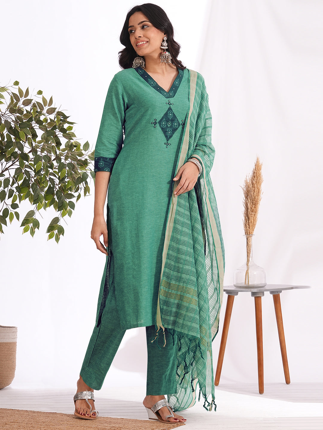 straight fit cotton embroidered suit set with a screen printed dupatta & self bottom.