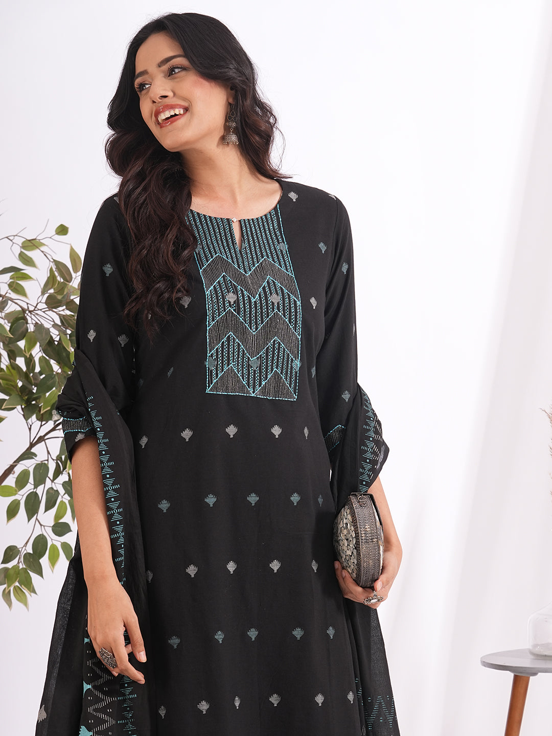 3-piece jamdani suit set is paired with machine embroidered kurta, plain bottom and printed dupatta.