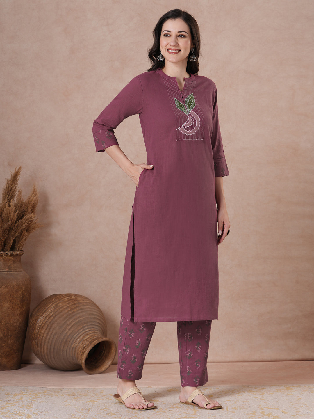Magenta Applique Yoke Kurta Set with floral printed pants.