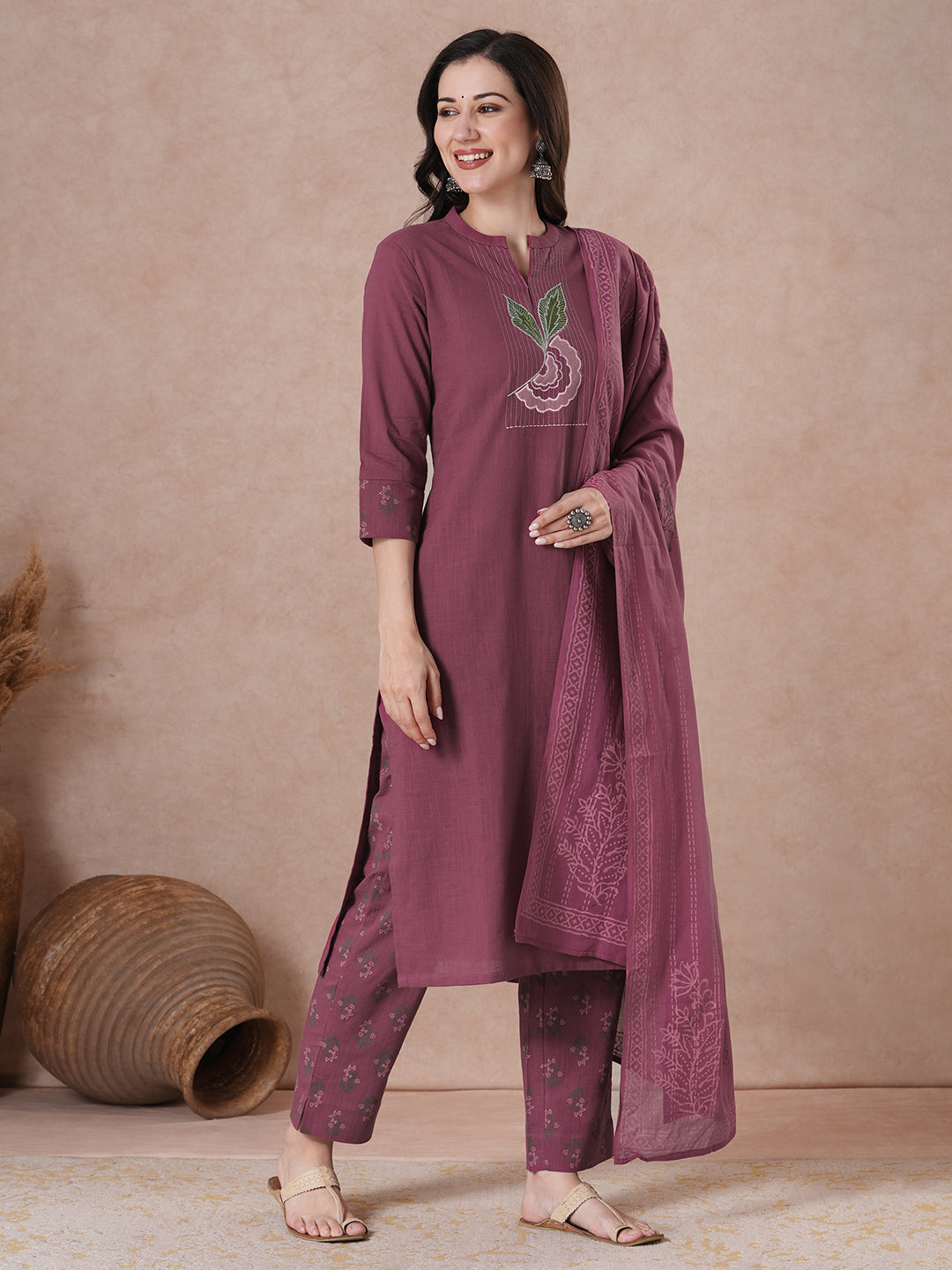 Magenta Applique Yoke Kurta Set with floral printed pants.