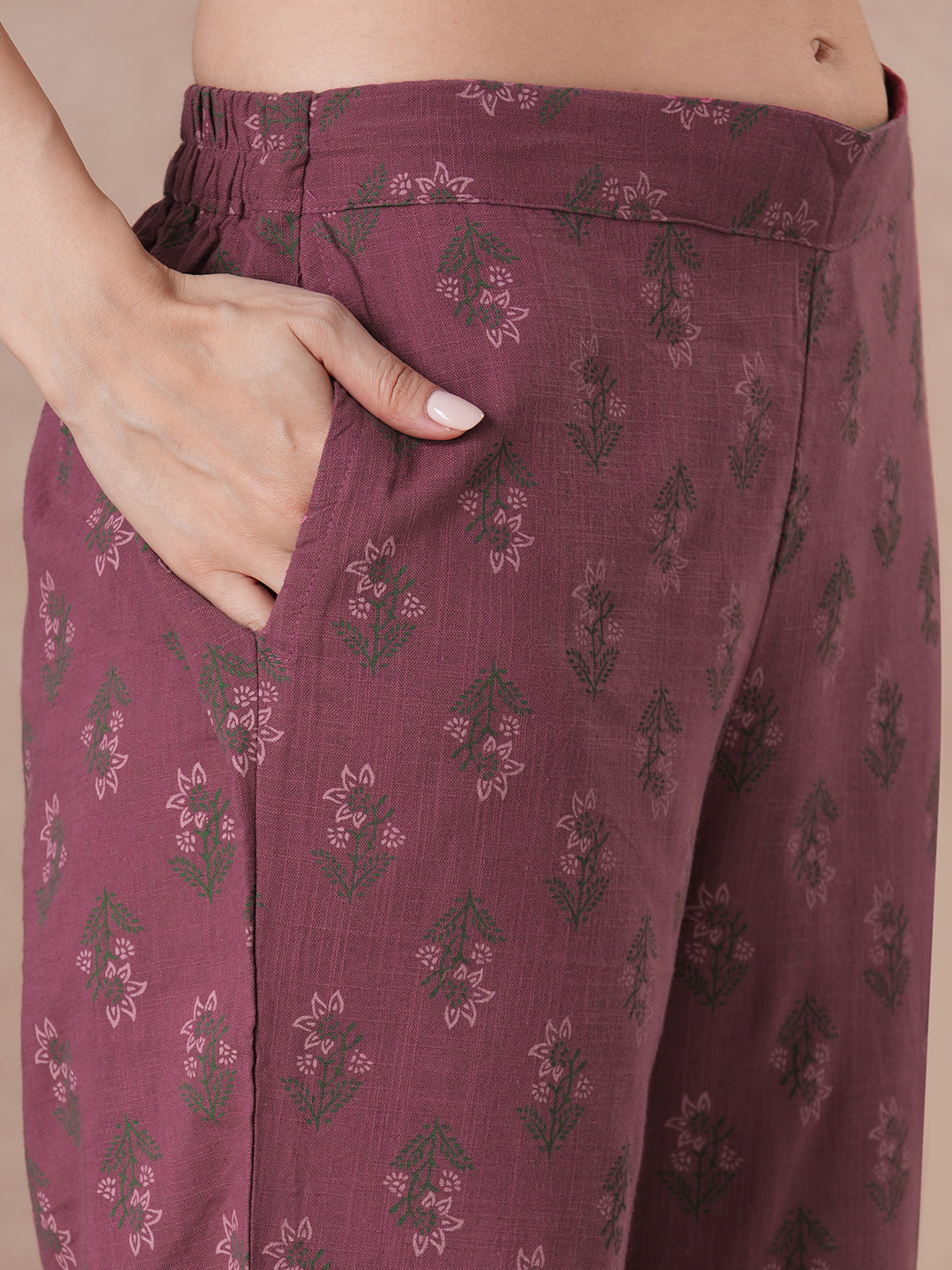 Magenta Applique Yoke Kurta Set with floral printed pants.