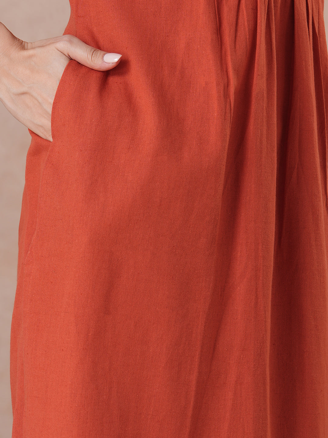 Rust Orange A-Line Kurta Set with Intricate Embroidered Yoke, Printed Dupatta and Matching Solid Pants.