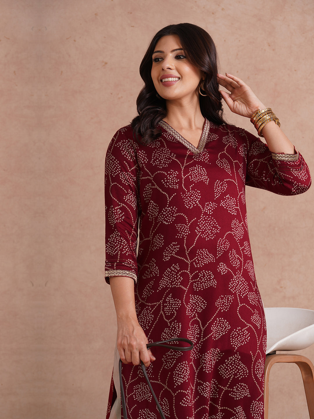 Party Edit- Straight fit kurta in printed gajji satin with embroidered neck and sleeve border.