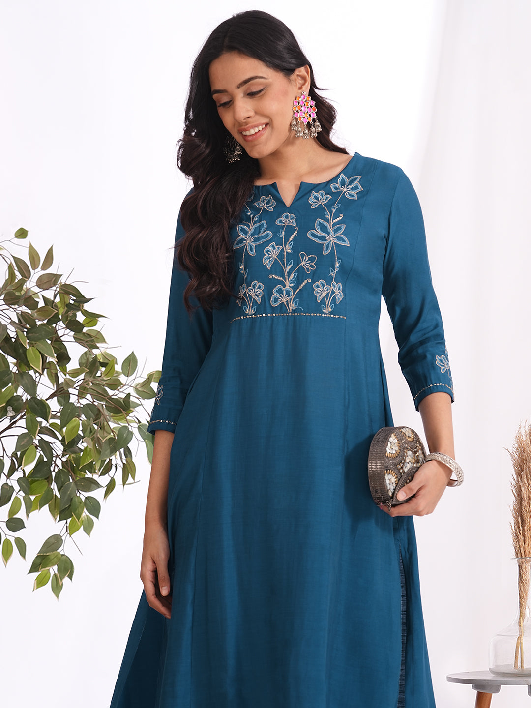 Pocketed A-line kurta in art silk fabric with zari and thread embroidery