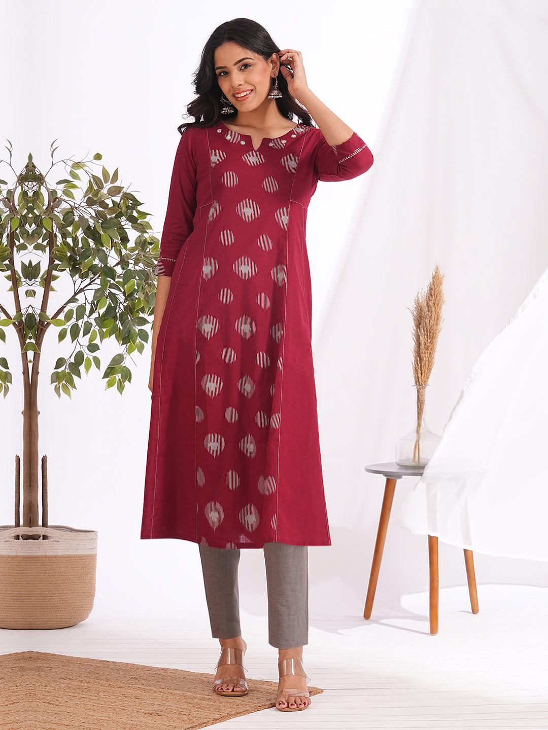 Pocketed A-line cotton kurta with a printed centre panel and hand work detailing (Maroon)