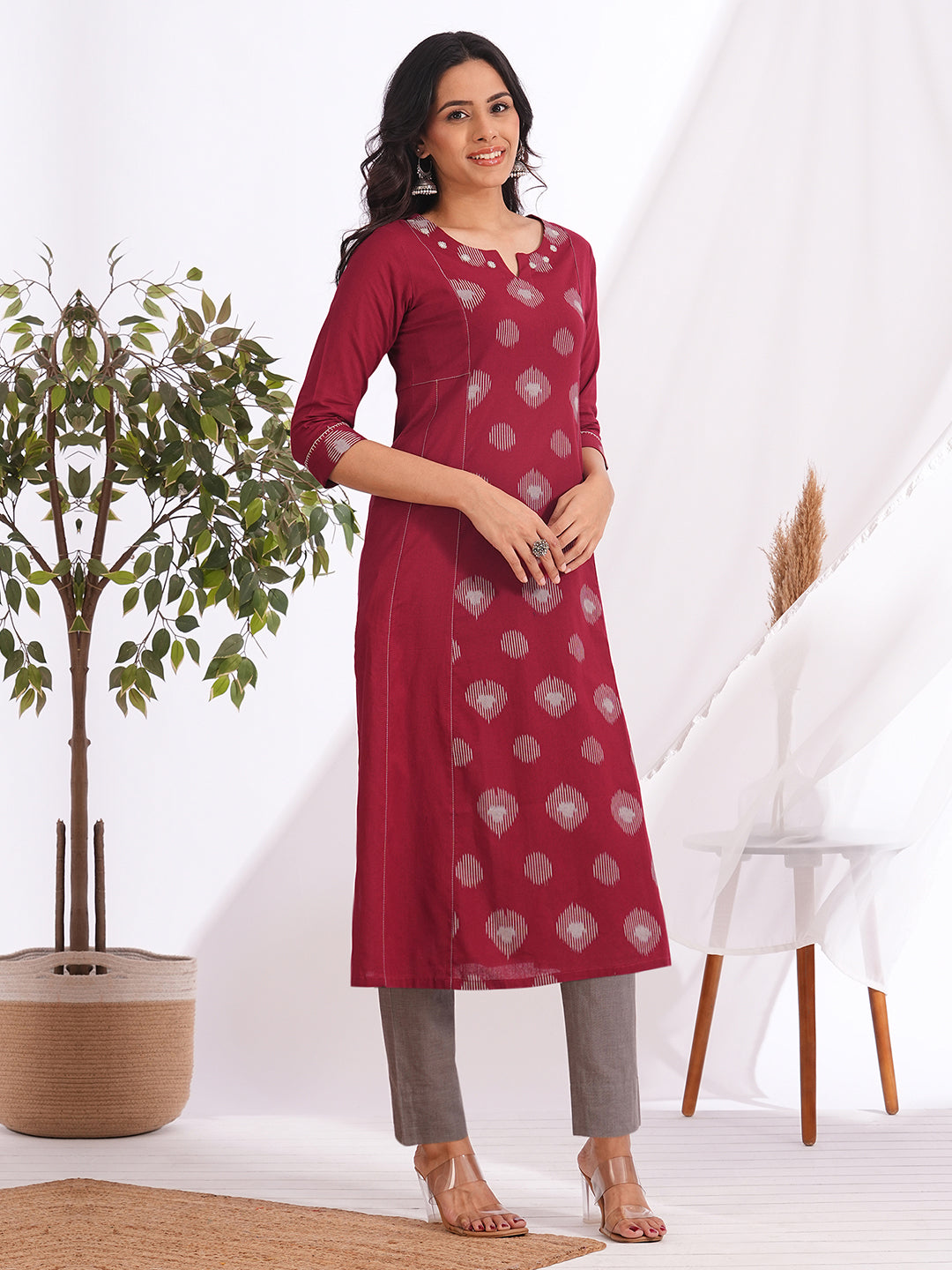Pocketed A-line cotton kurta with a printed centre panel and hand work detailing (Maroon)