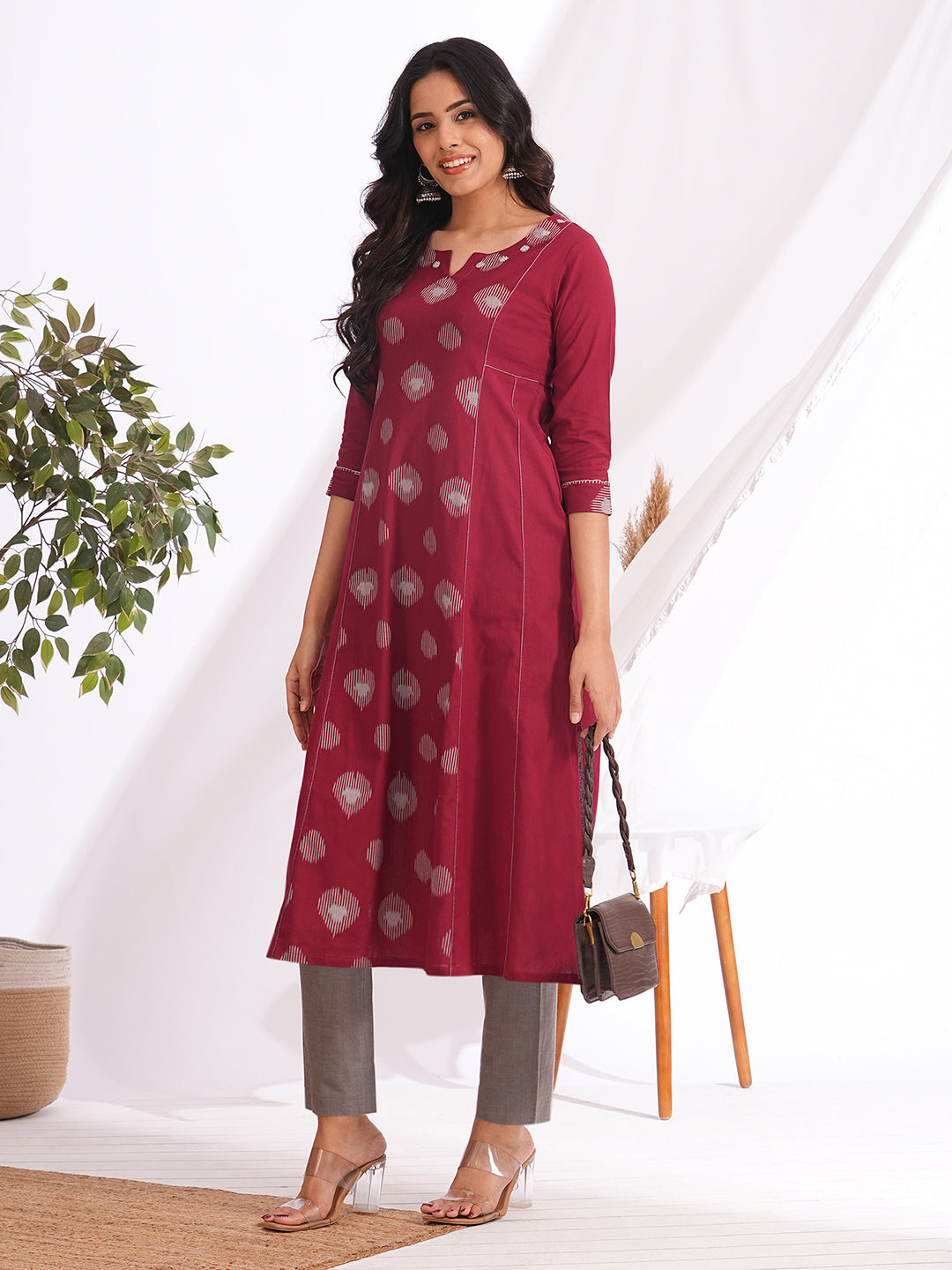 Pocketed A-line cotton kurta with a printed centre panel and hand work detailing (Maroon)