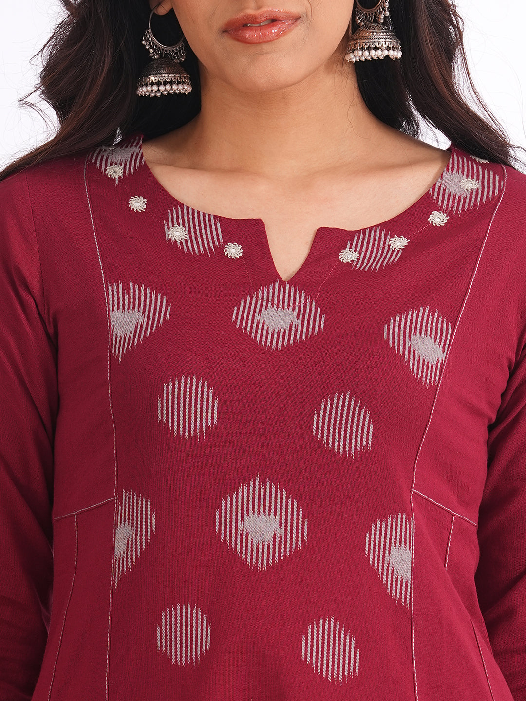 Pocketed A-line cotton kurta with a printed centre panel and hand work detailing (Maroon)