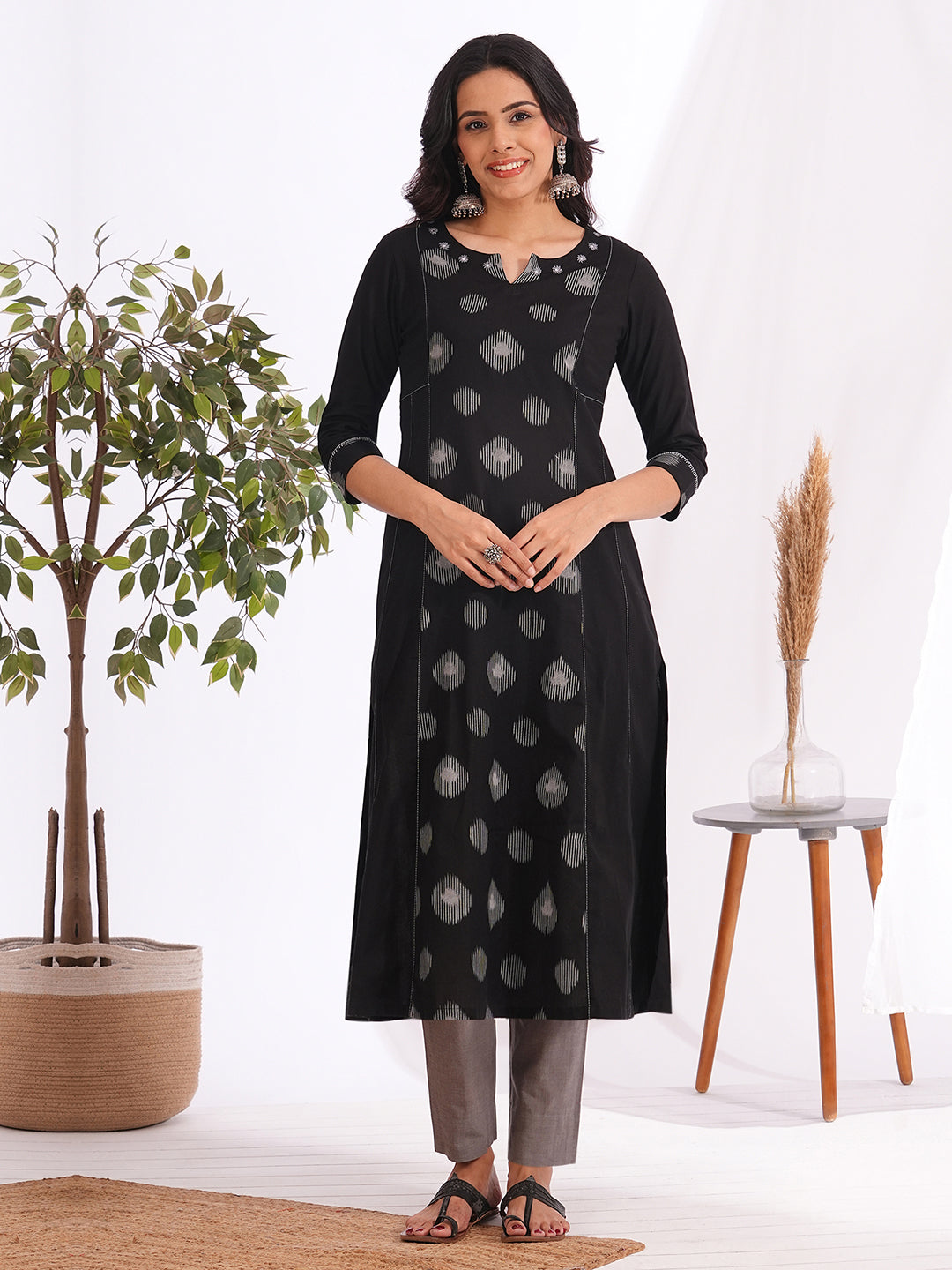 Pocketed A-line cotton kurta with a printed centre panel and hand work detailing (Black)