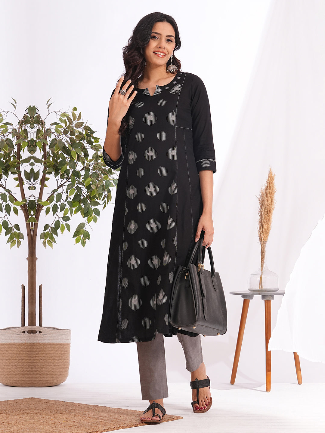 Pocketed A-line cotton kurta with a printed centre panel and hand work detailing (Black)