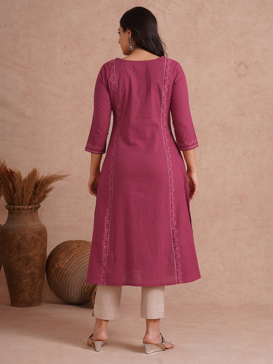 A-Line fit cotton slurb kurta with hand embroidery, block print and an inseam pocket.