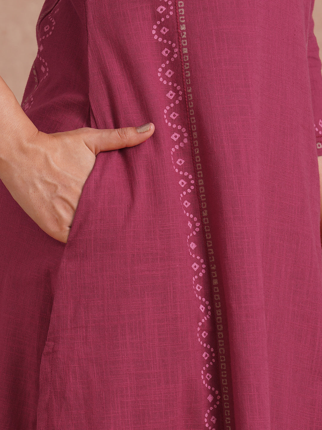 A-Line fit cotton slurb kurta with hand embroidery, block print and an inseam pocket.