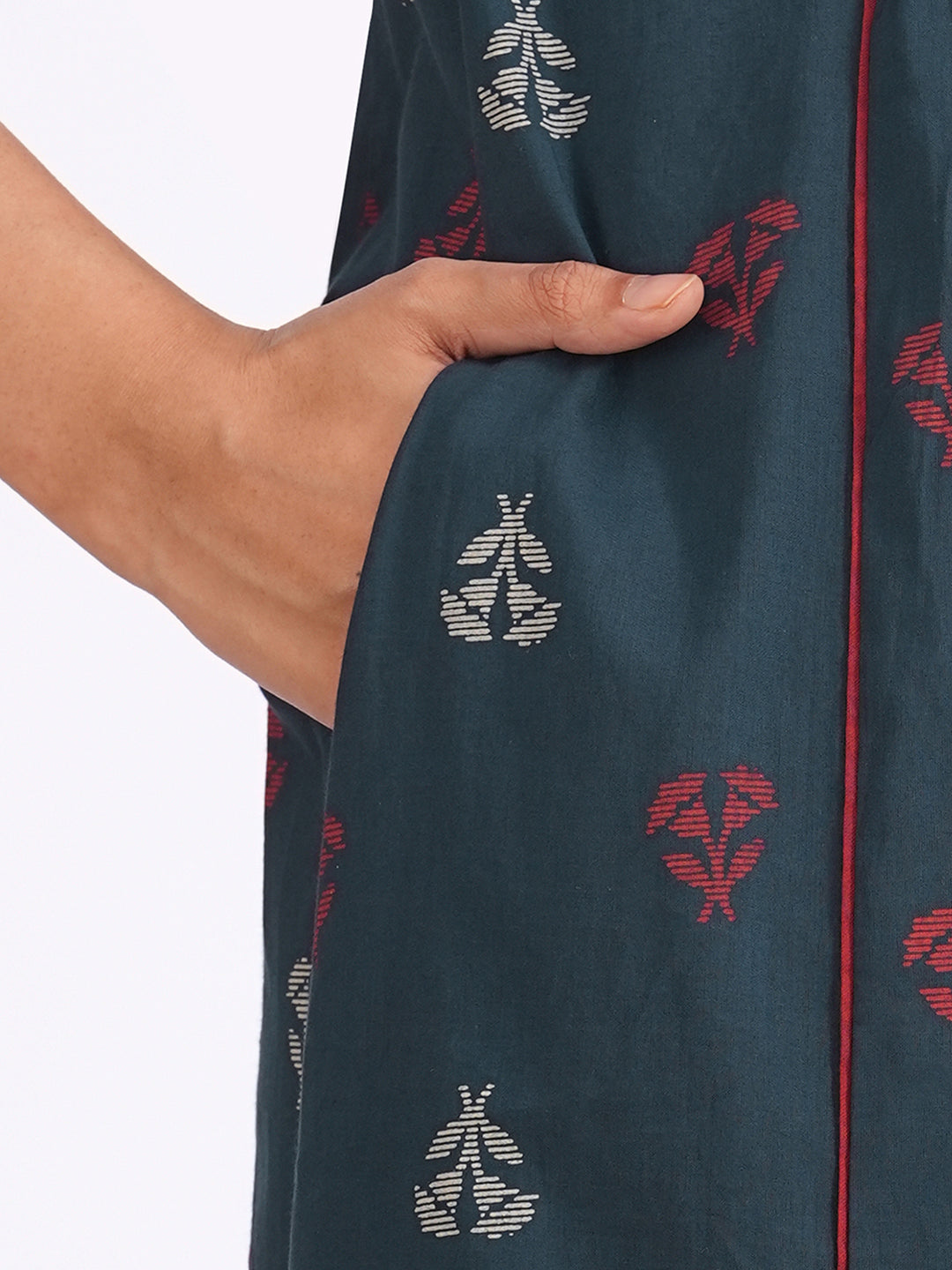 A-line pleated kurta with an printed cotton fabric with hand embroidery and pocket