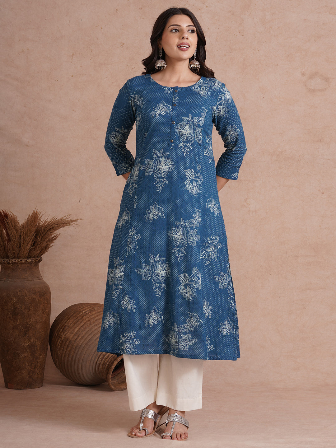 A-Line kurta with an in seam pocket and centre placket on printed cotton jacquard fabric.