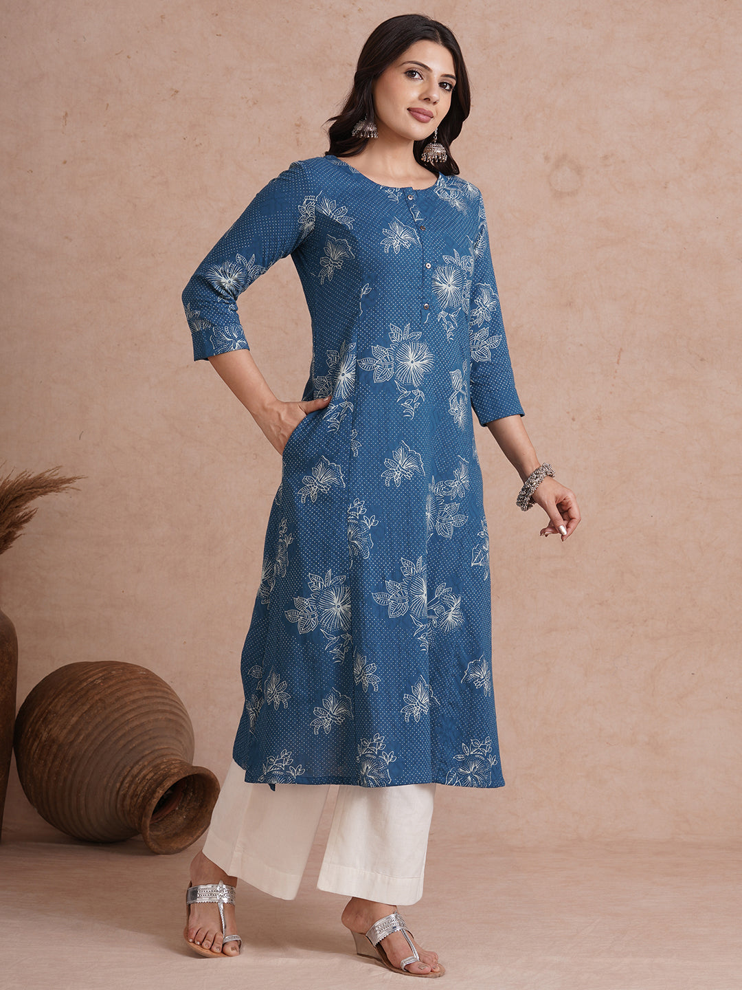 A-Line kurta with an in seam pocket and centre placket on printed cotton jacquard fabric.