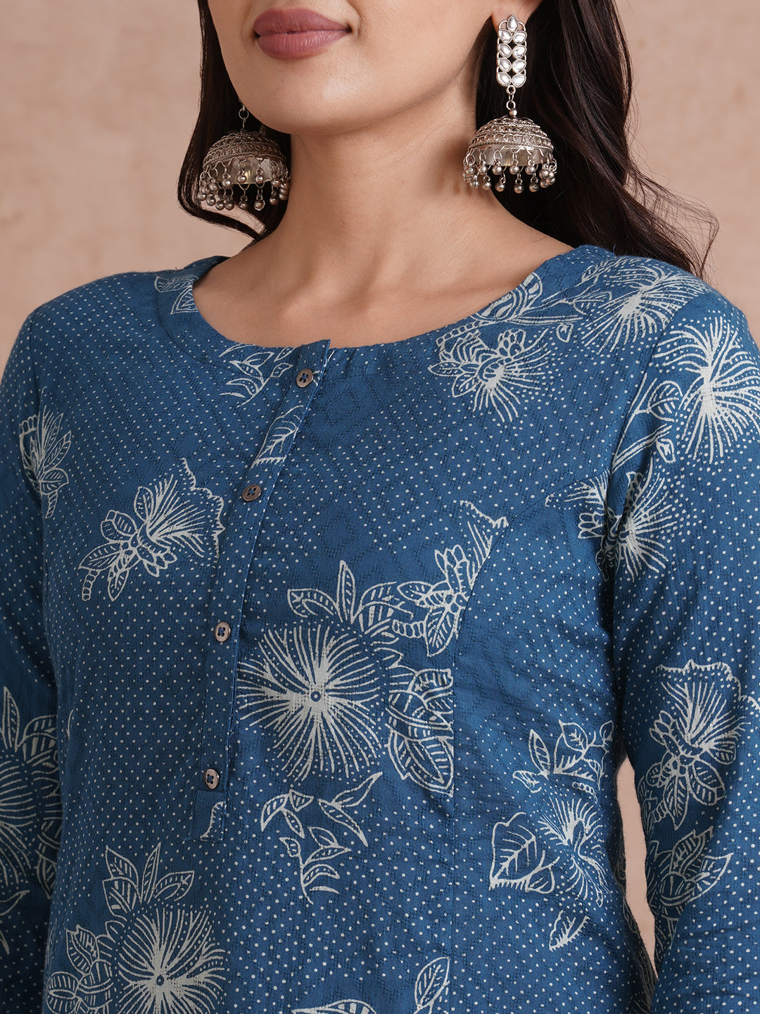 A-Line kurta with an in seam pocket and centre placket on printed cotton jacquard fabric.