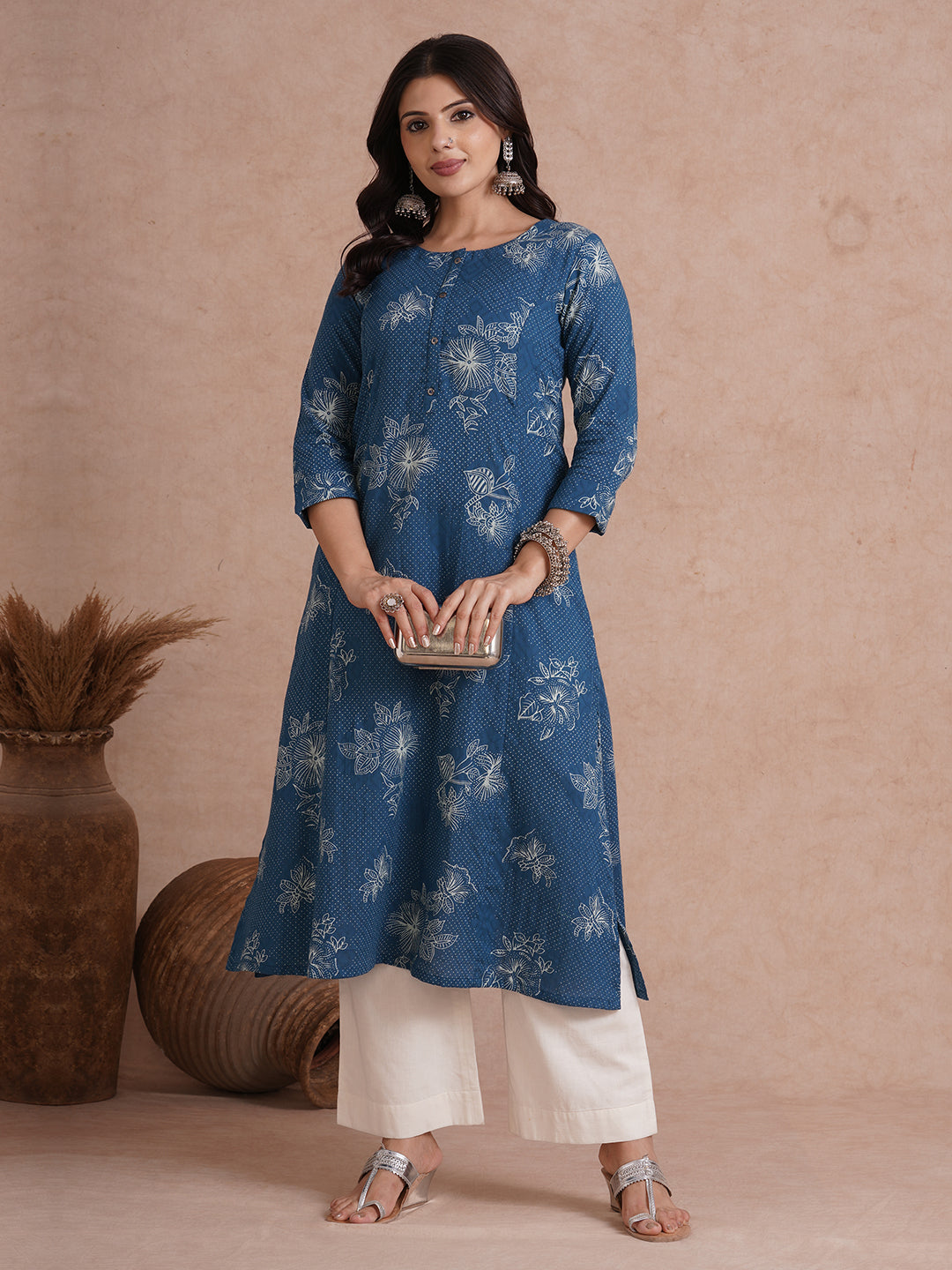 A-Line kurta with an in seam pocket and centre placket on printed cotton jacquard fabric.