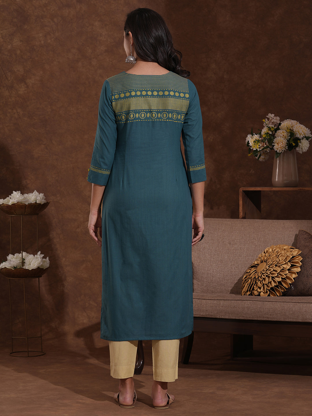 Straight fit woven cotton kurta in azure blue shade with mirror work.