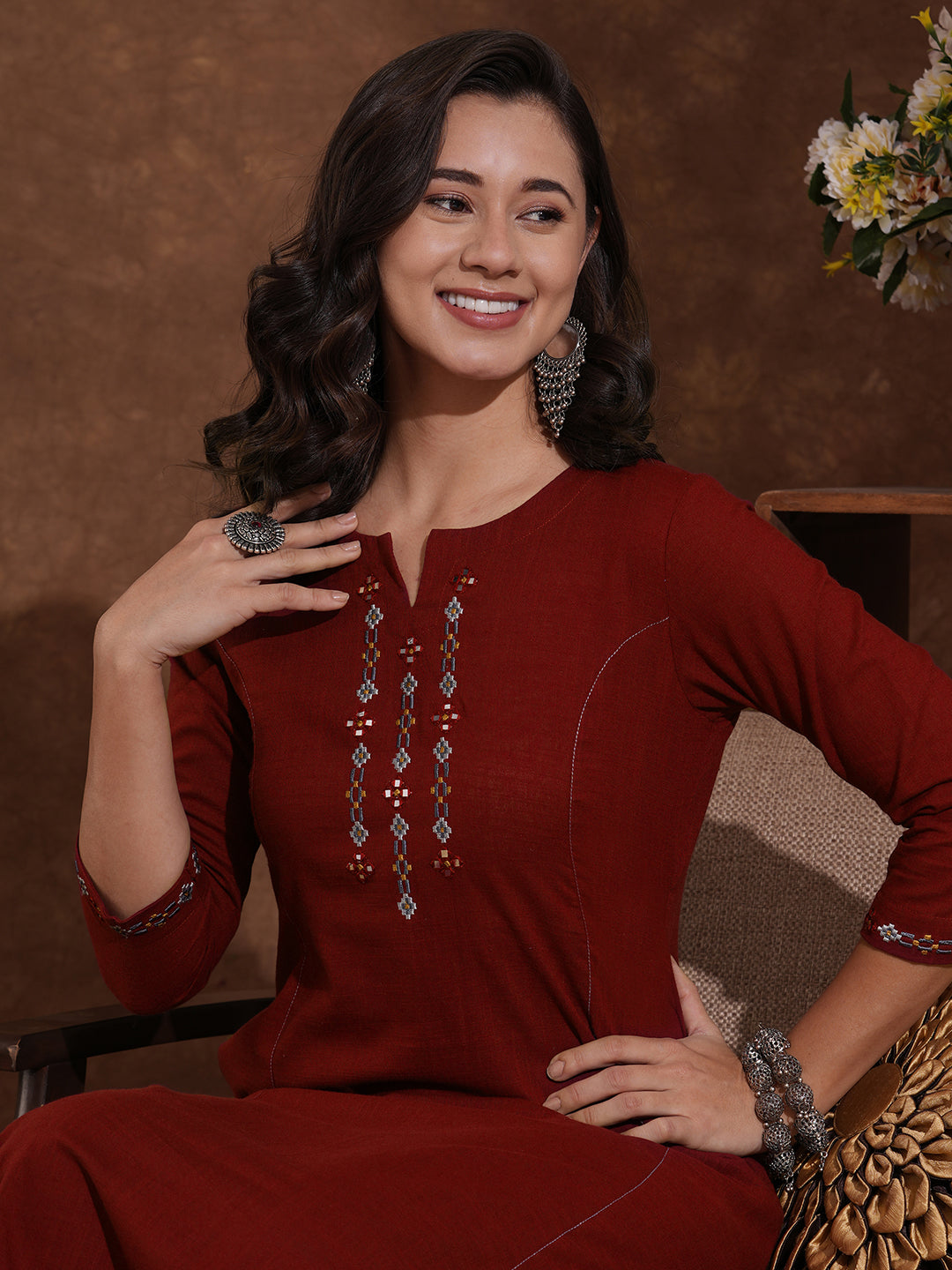 Pocketed cotton slurb kurta in an A-line fit with thread and mirror work.