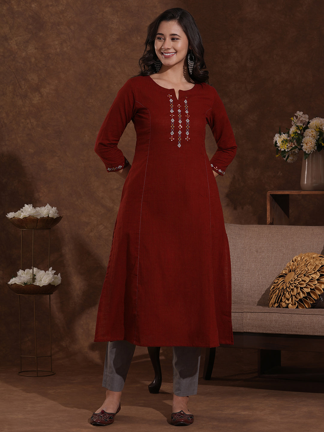 Pocketed cotton slurb kurta in an A-line fit with thread and mirror work.