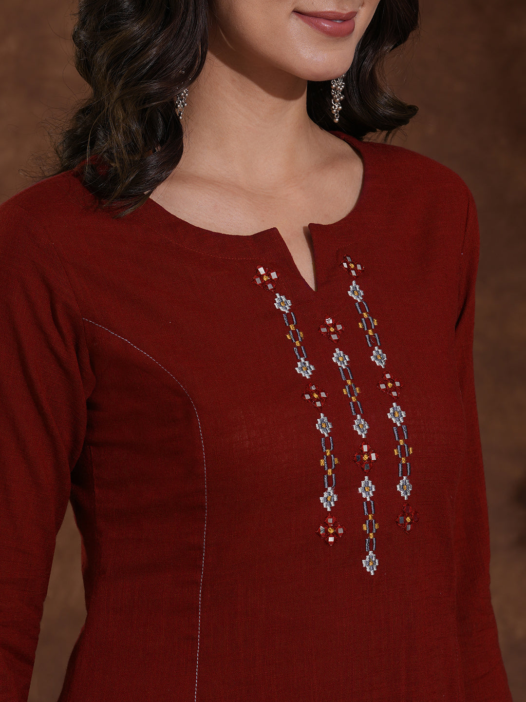 Pocketed cotton slurb kurta in an A-line fit with thread and mirror work.