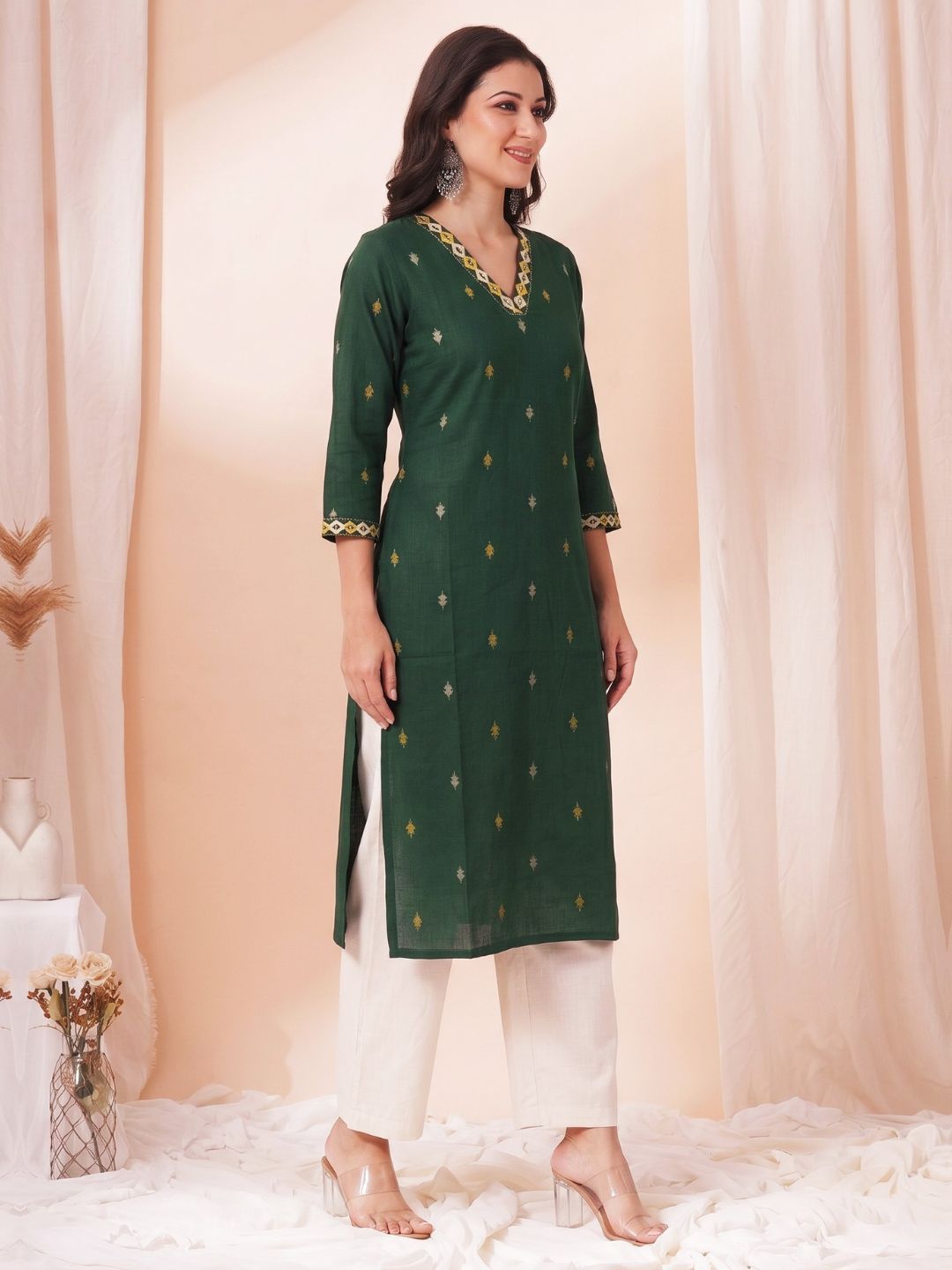 Women Green Straight Fit Cotton Woven Kurta with Embroidered Neckline & Sleeves.