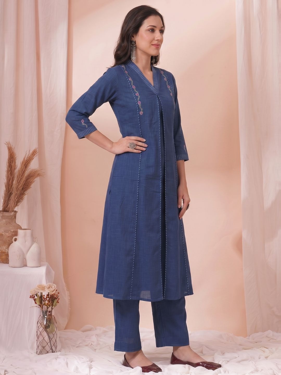 A-Line Cotton Kurta with Elegance Floral Embroidered Yoke and Contrast Piping Detailing.