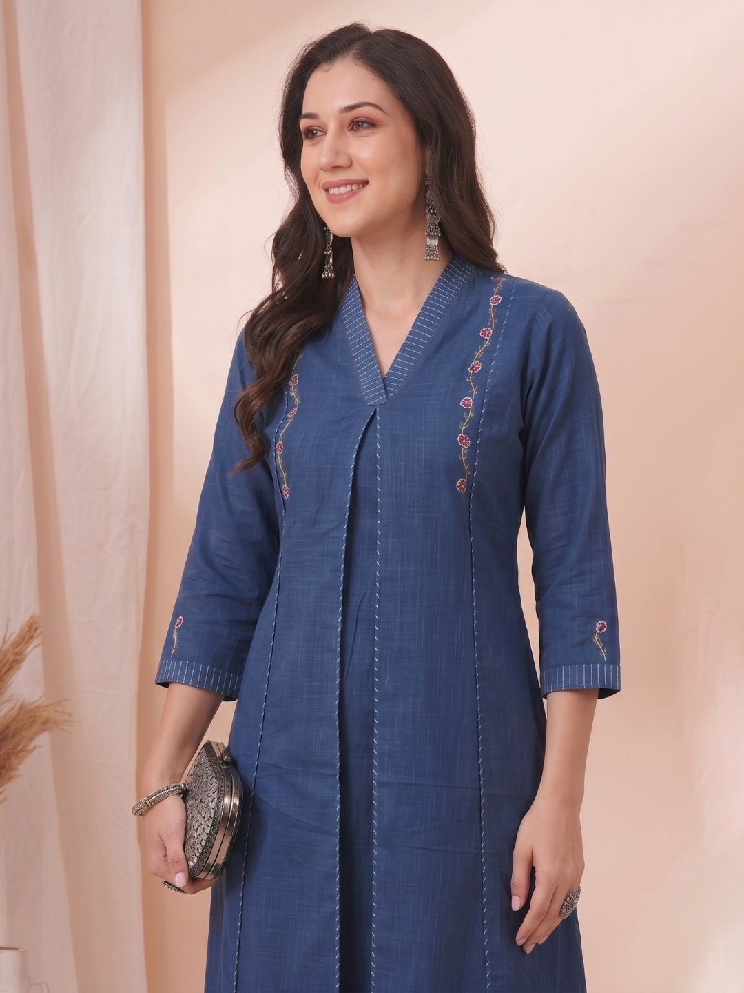 A-Line Cotton Kurta with Elegance Floral Embroidered Yoke and Contrast Piping Detailing.