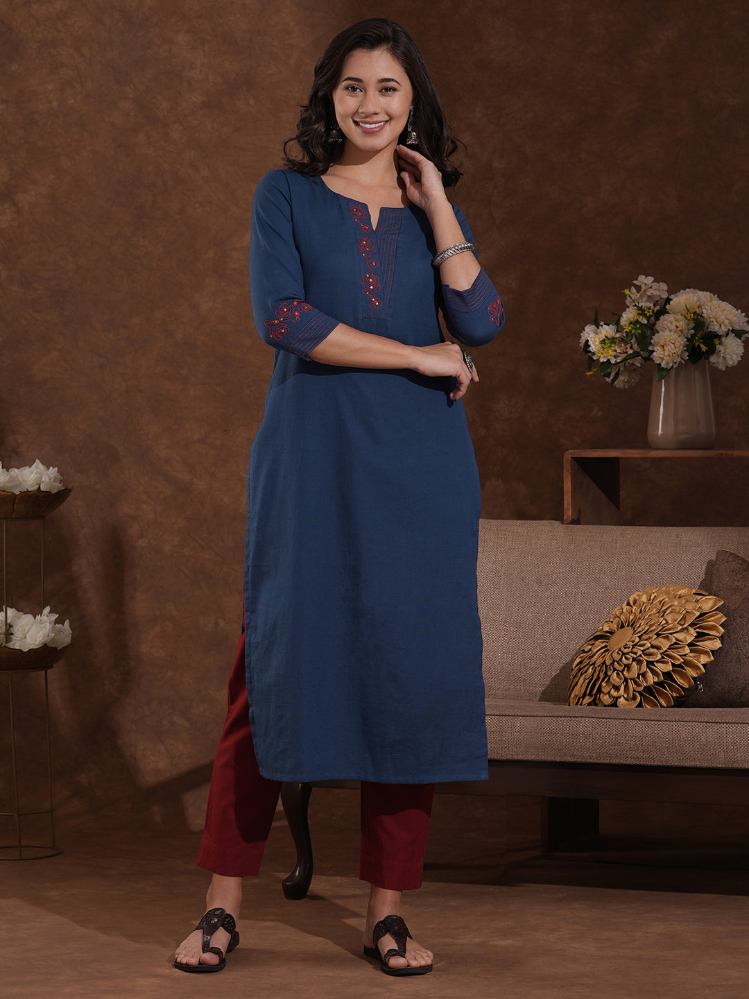 Embroidered straight fit kurta in cotton flex with sequin work.