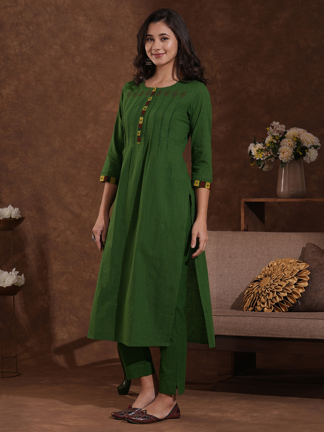 Straight fit kurta with block printed shoulder yoke and tucks in the front with ajarakh trim fabric.