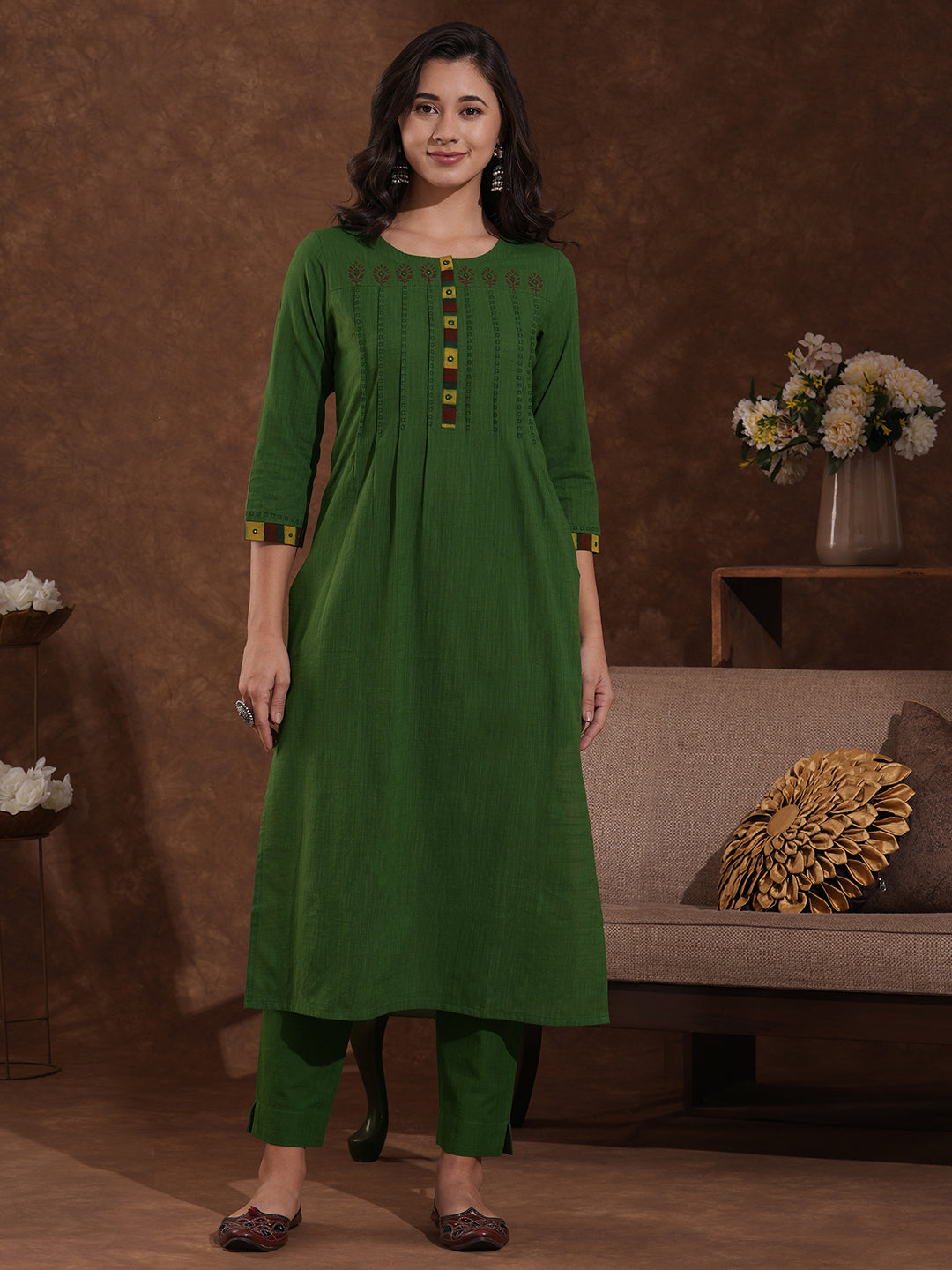 Straight fit kurta with block printed shoulder yoke and tucks in the front with ajarakh trim fabric.