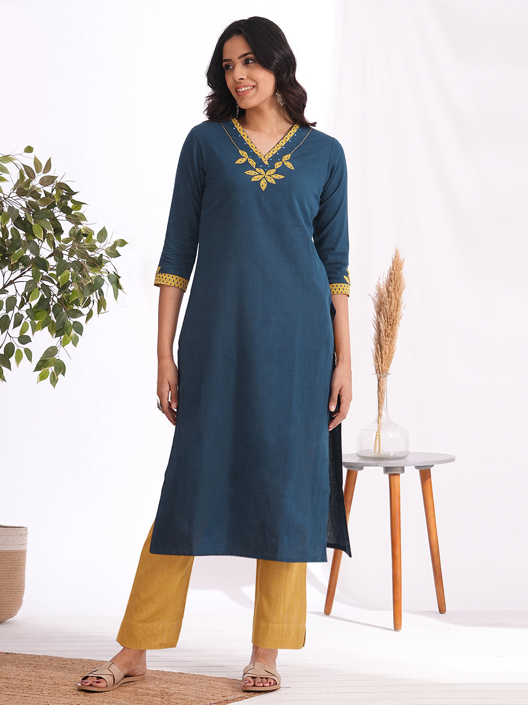 Straight fit kurta with contrast applique on neck and sleeves with contrast trim detailing