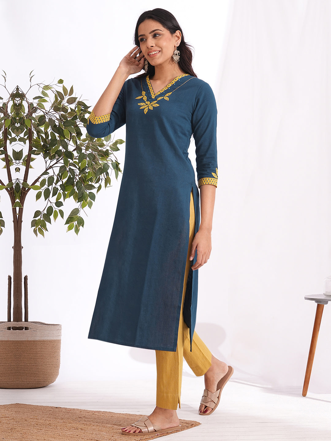 Straight fit kurta with contrast applique on neck and sleeves with contrast trim detailing