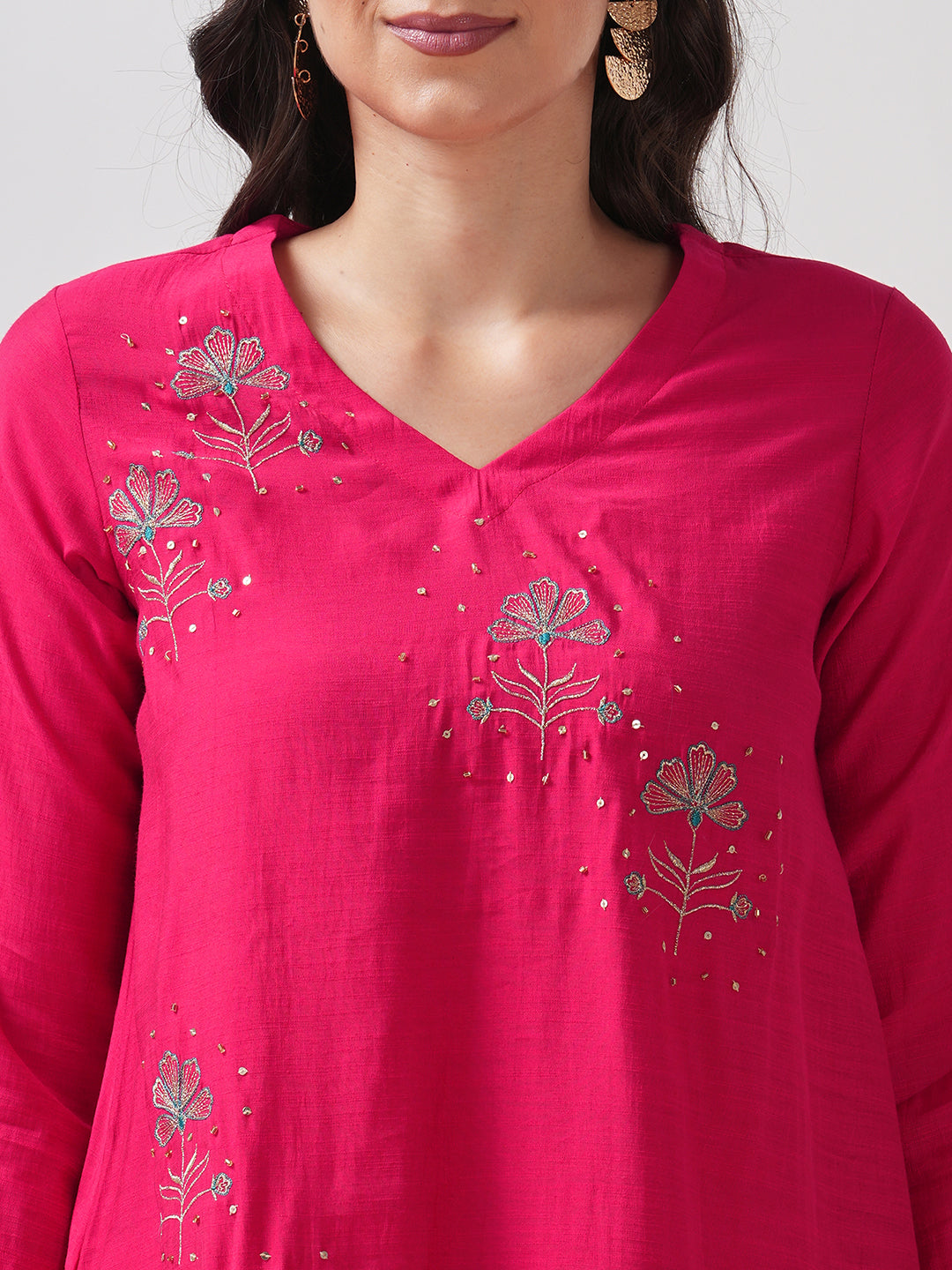 Party Edit- A tent fit kurta with placement embroidery and handwork sequence on the front and sleeves.