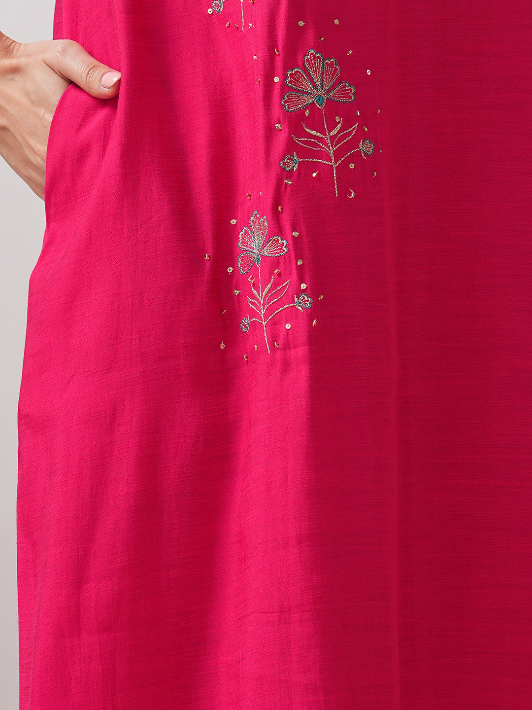 Party Edit- A tent fit kurta with placement embroidery and handwork sequence on the front and sleeves.