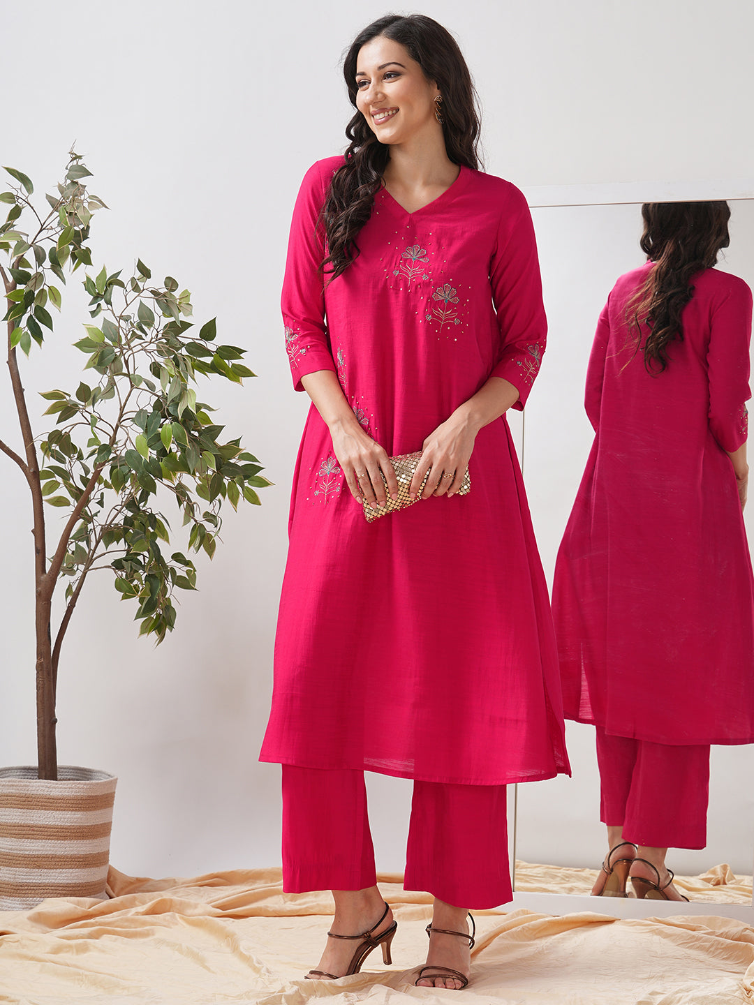 Party Edit- A tent fit kurta with placement embroidery and handwork sequence on the front and sleeves.