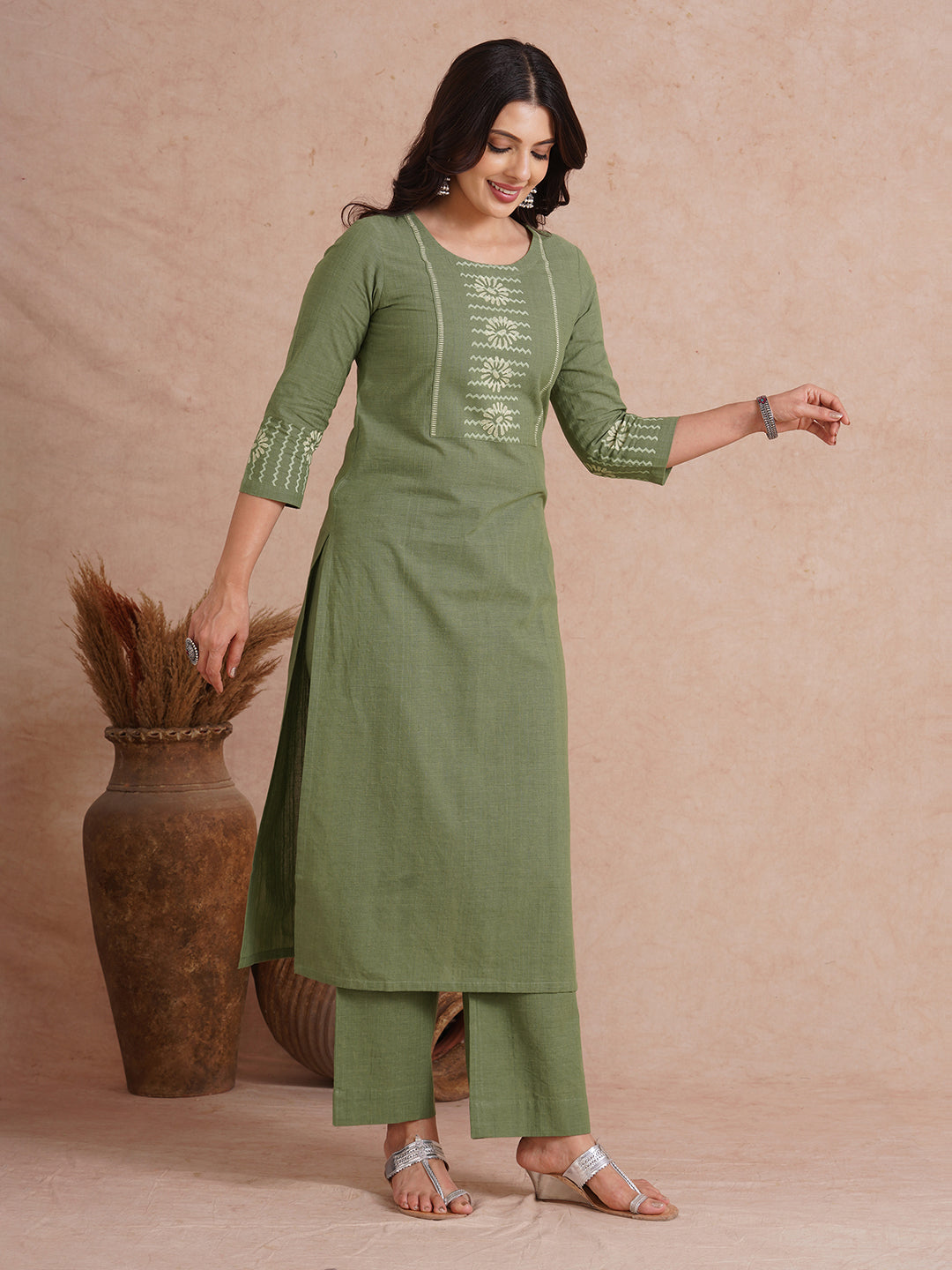 Straight fit kurta with block printed yoke and sleeves.