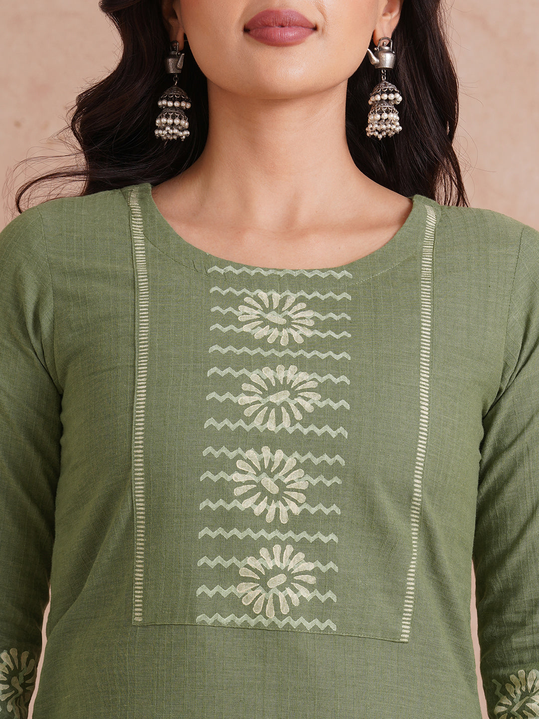 Straight fit kurta with block printed yoke and sleeves.