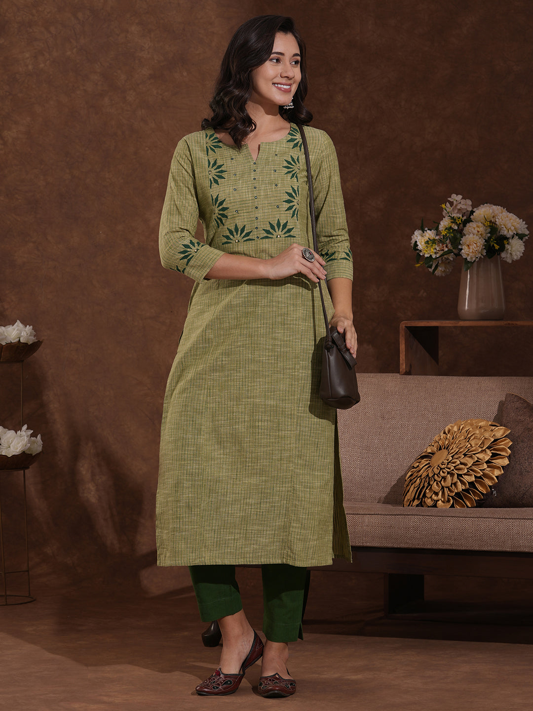 Straight fit kurta in woven stripes with block printed yoke and sleeves.