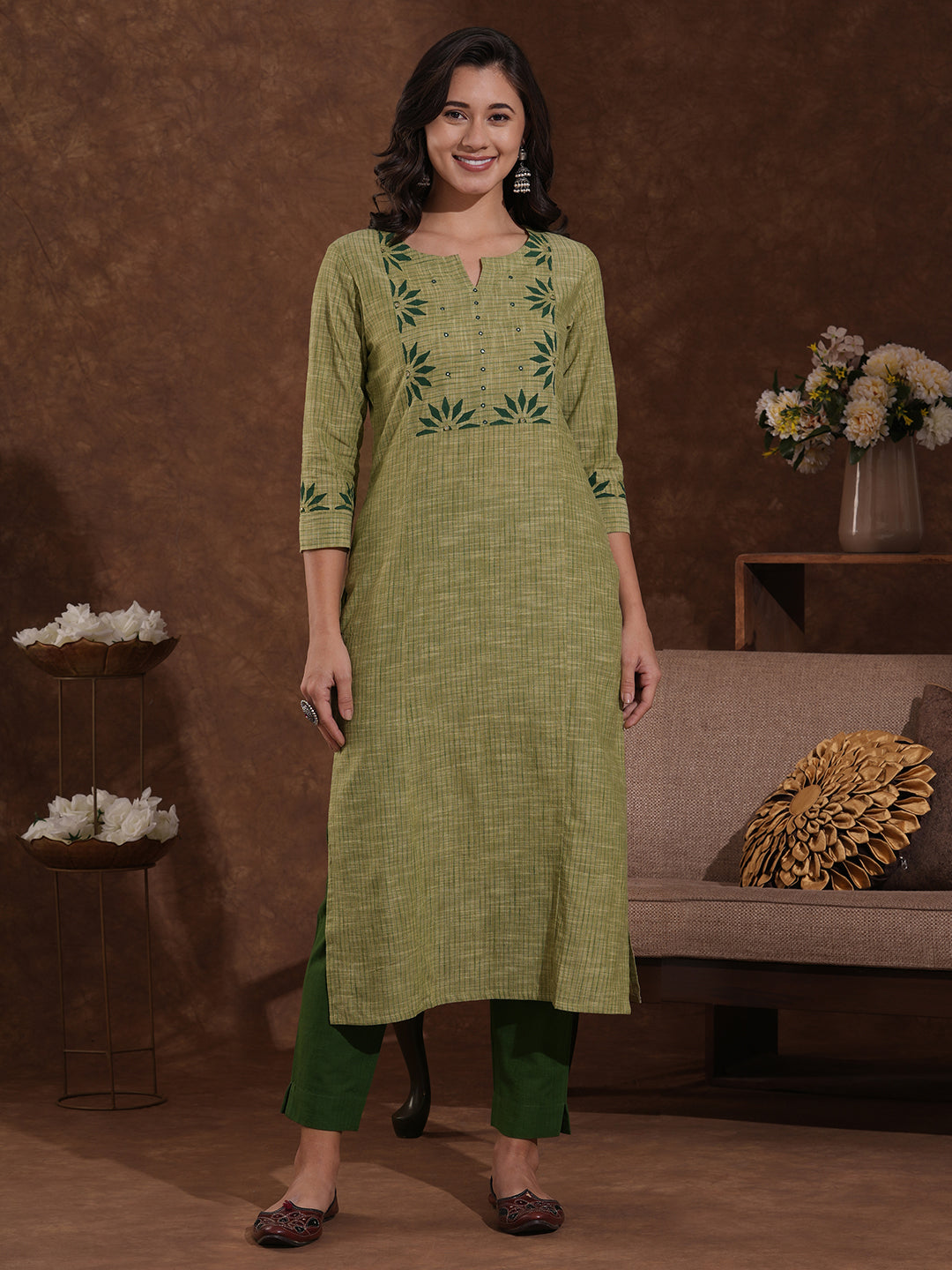 Straight fit kurta in woven stripes with block printed yoke and sleeves.