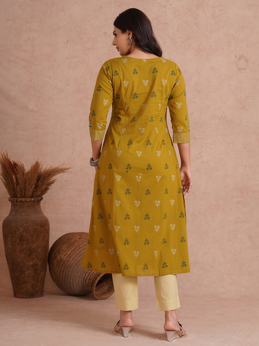 A-line printed kurta with trim fabric yoke and cuff highlighted with block print.