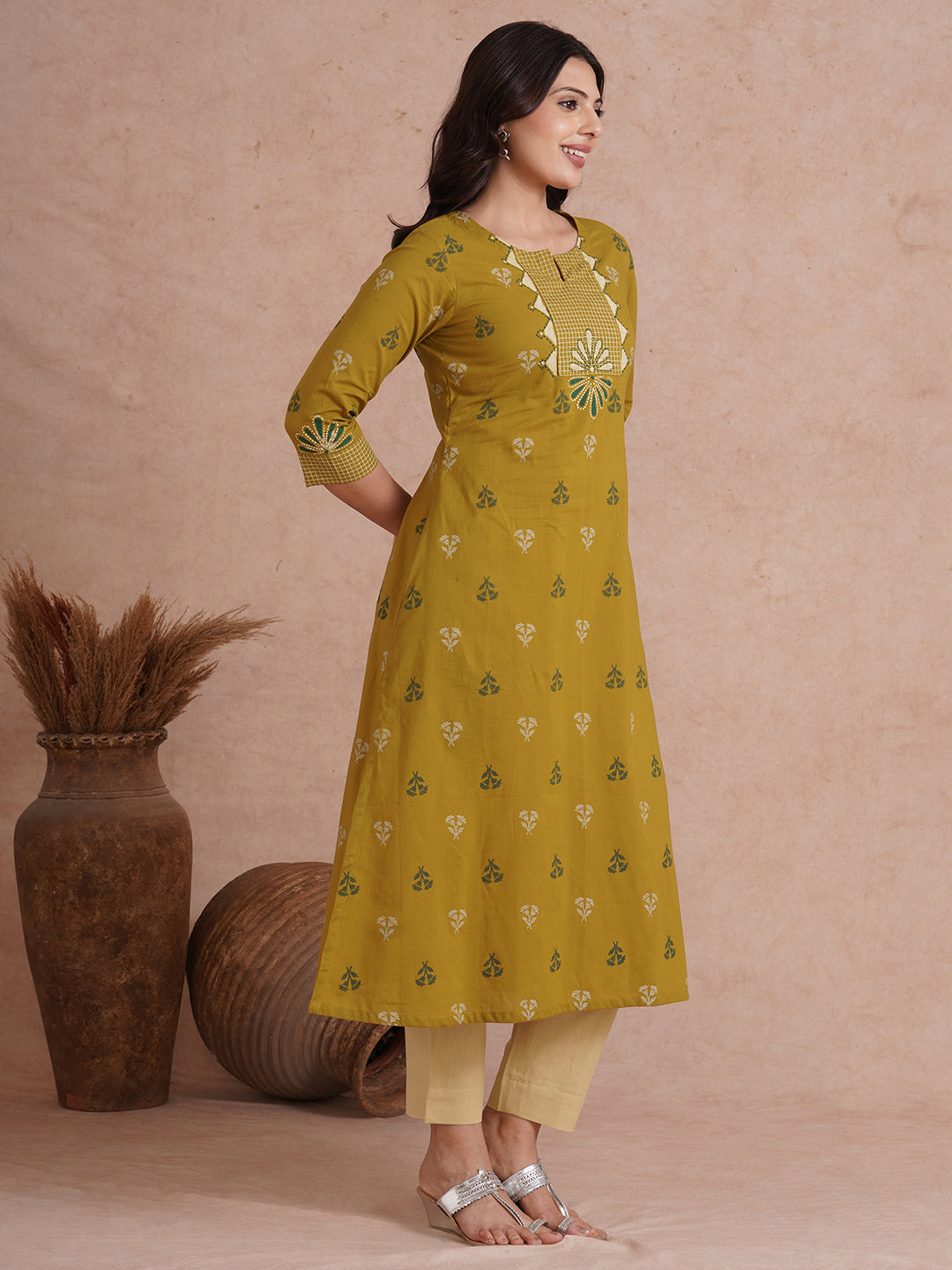 A-line printed kurta with trim fabric yoke and cuff highlighted with block print.