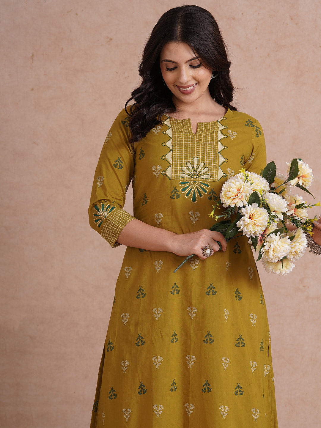 A-line printed kurta with trim fabric yoke and cuff highlighted with block print.