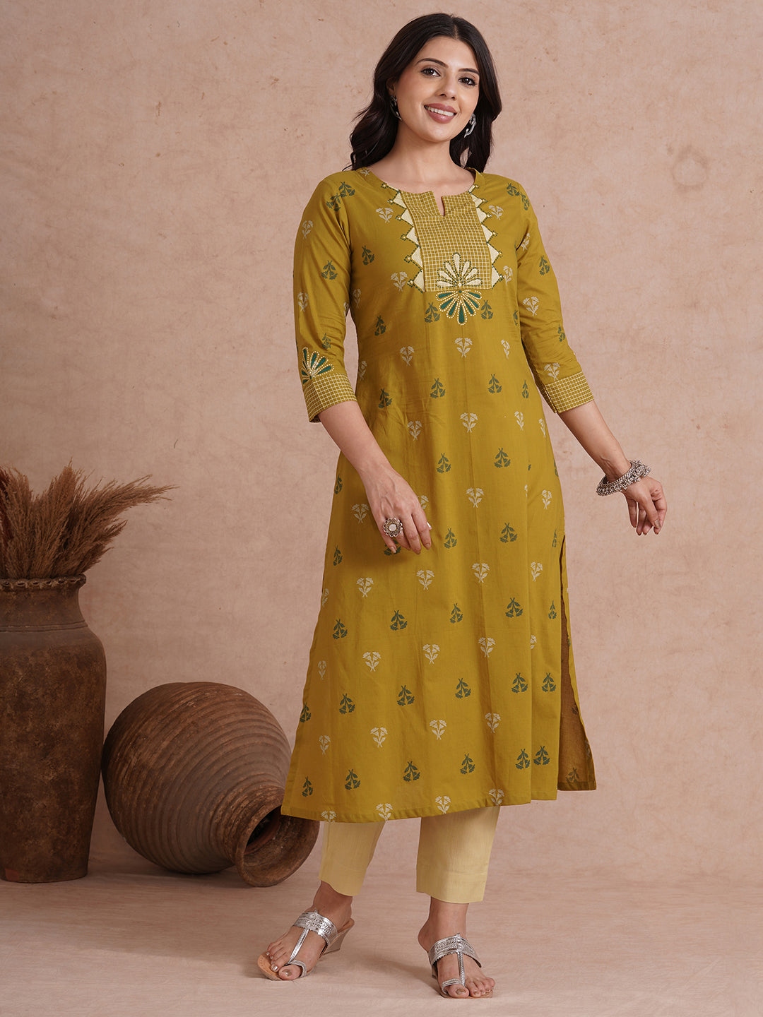 A-line printed kurta with trim fabric yoke and cuff highlighted with block print.