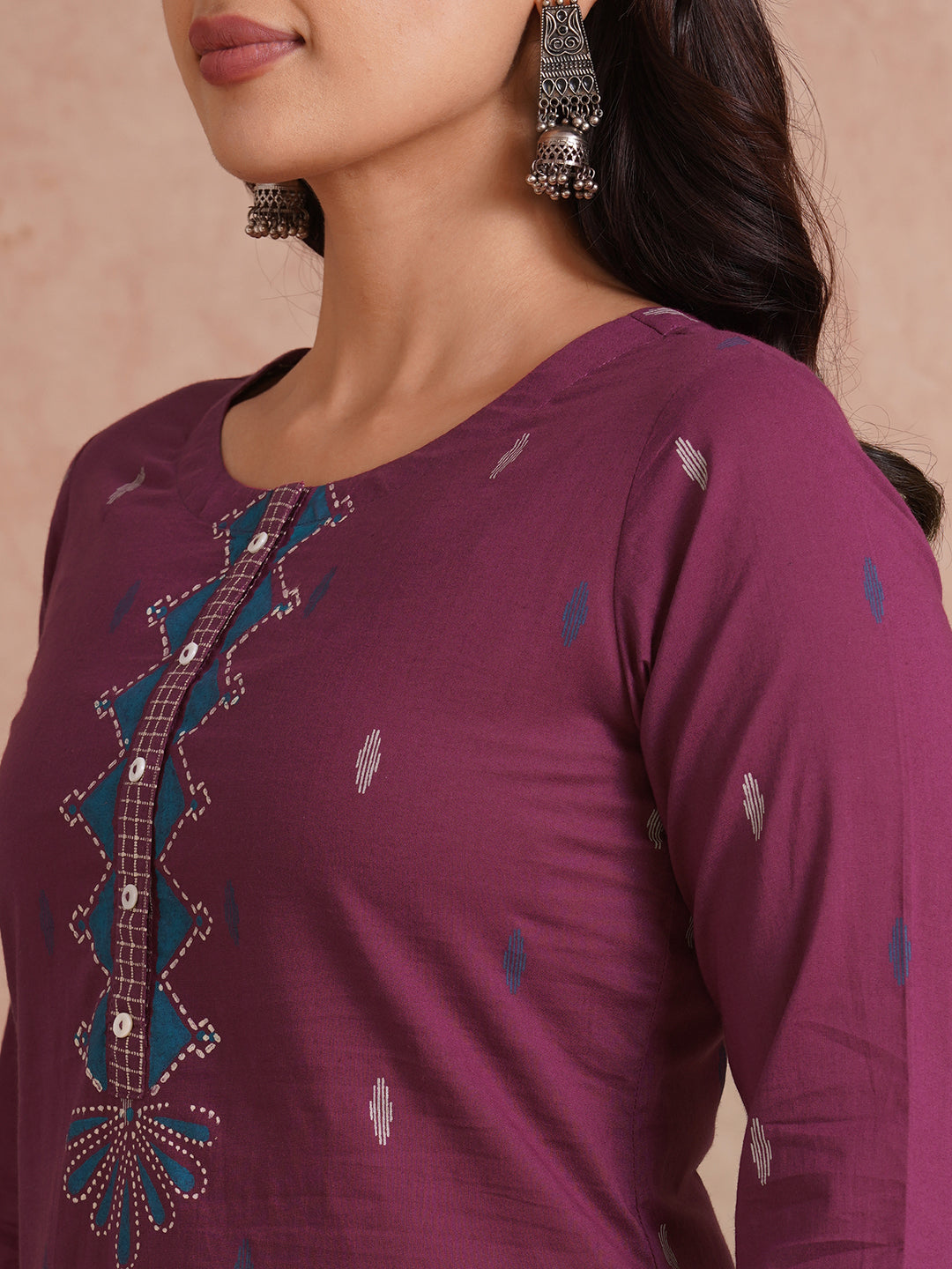 Straight fit printed kurta with trim fabric placket and cuff highlighted with block print.