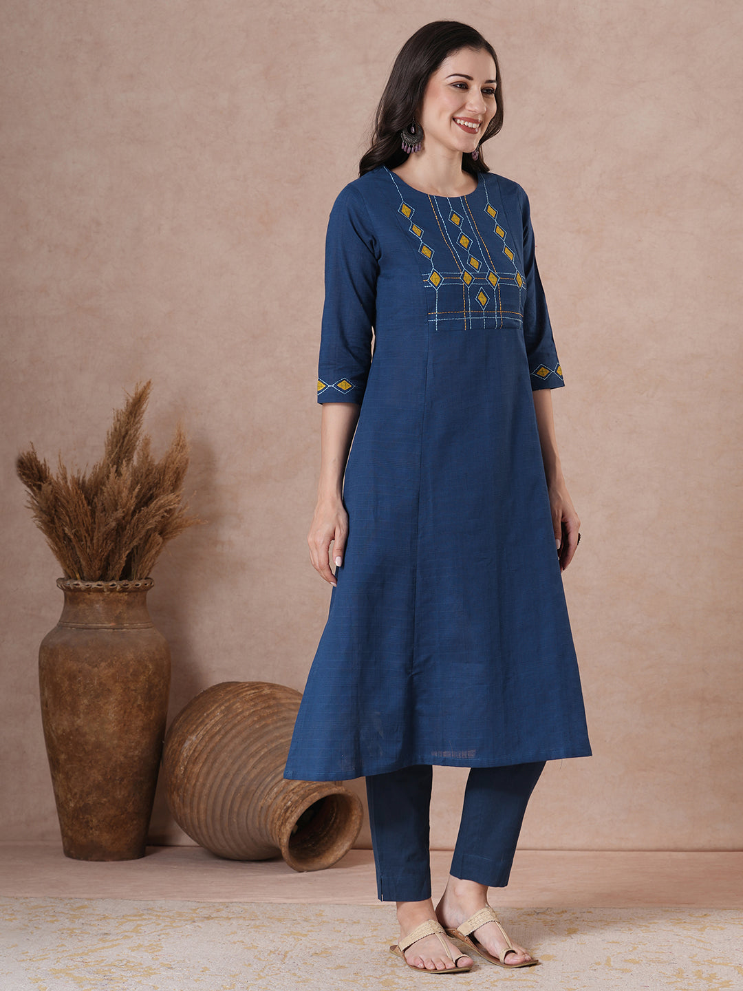 A-Line Cotton Kurta with Woven Texture, Embroidered Yoke and Geometric Applique