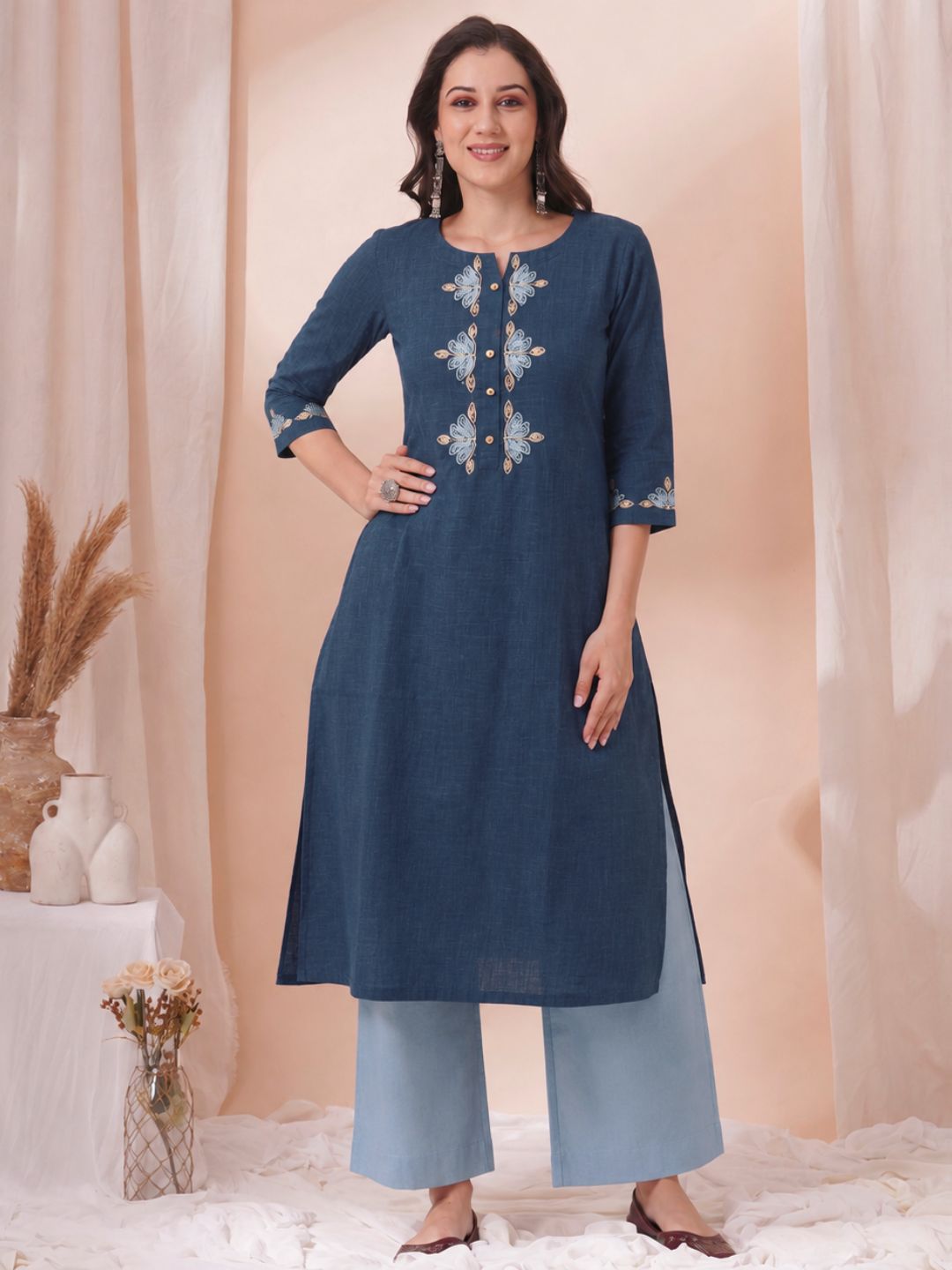 A-Line Cotton Slub Kurta with Floral Cordwork Embroidery on placket and sleeves.