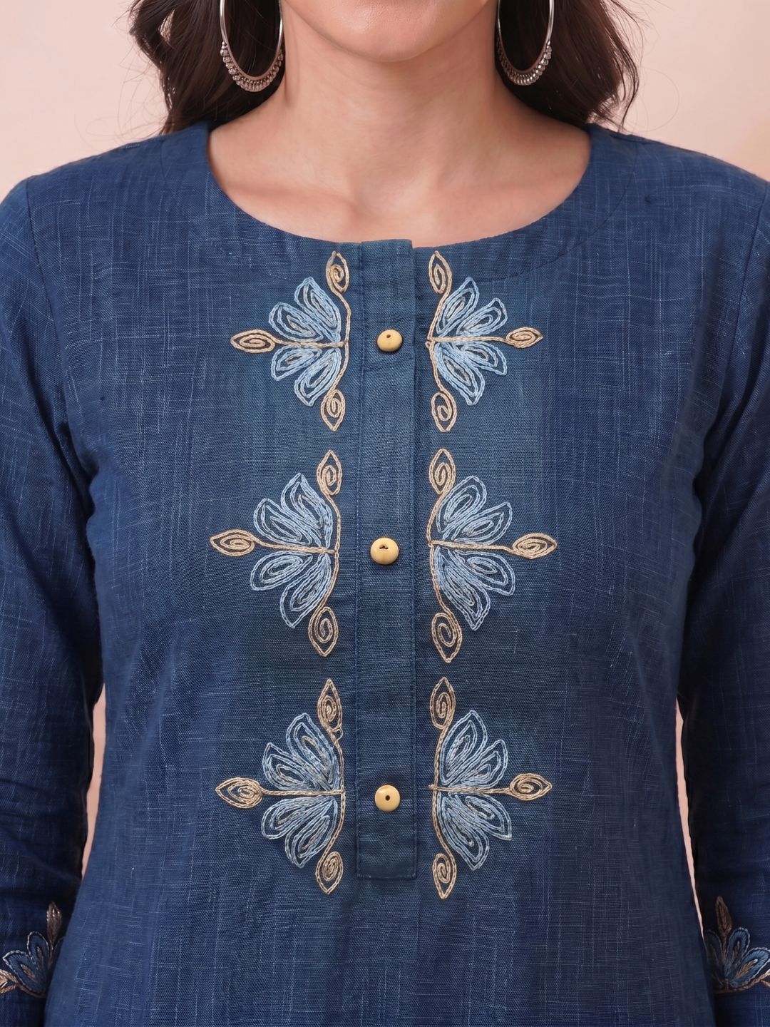 A-Line Cotton Slub Kurta with Floral Cordwork Embroidery on placket and sleeves.