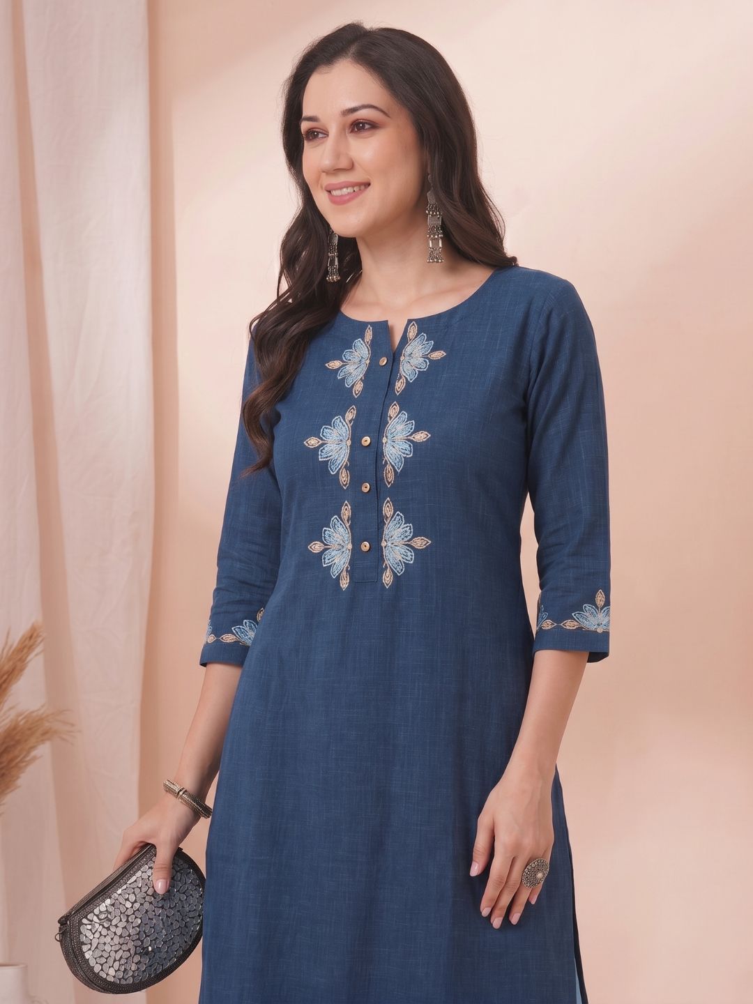 A-Line Cotton Slub Kurta with Floral Cordwork Embroidery on placket and sleeves.