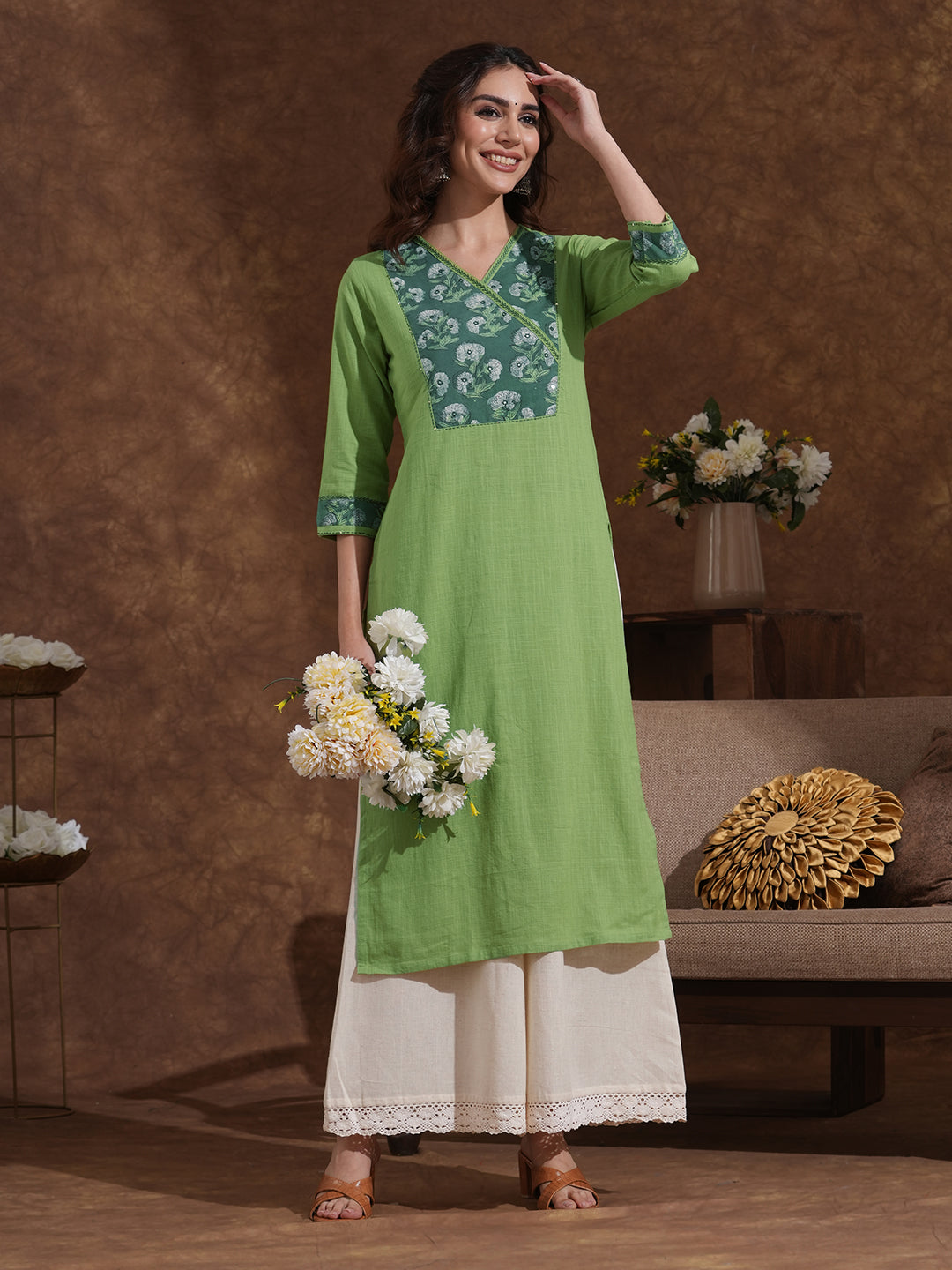 Straight fit kurta with Ajrakh overlap yoke and cuff with handwork highlight.